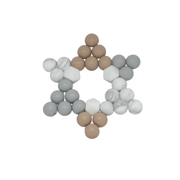 Greige - szürke és bézs színű csillag alakú rágóka Greige - szürke és bézs színű csillag alakú rágóka