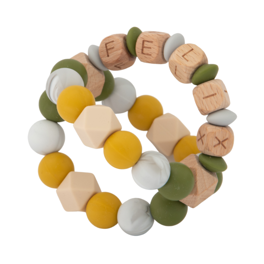 Névre szóló, fogzáskönnyítő labda rágóka fiús színben - Rainy day